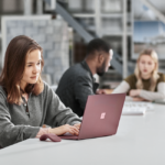 BTS focused student photography in classroom using Surface Laptop
