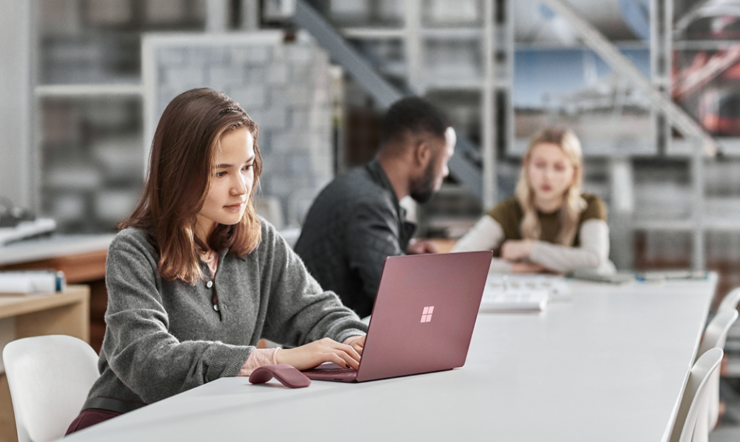 BTS focused student photography in classroom using Surface Laptop