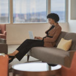 Woman with Surface Laptop Go