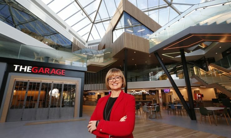 Cathriona Hallahan standing in front of a building