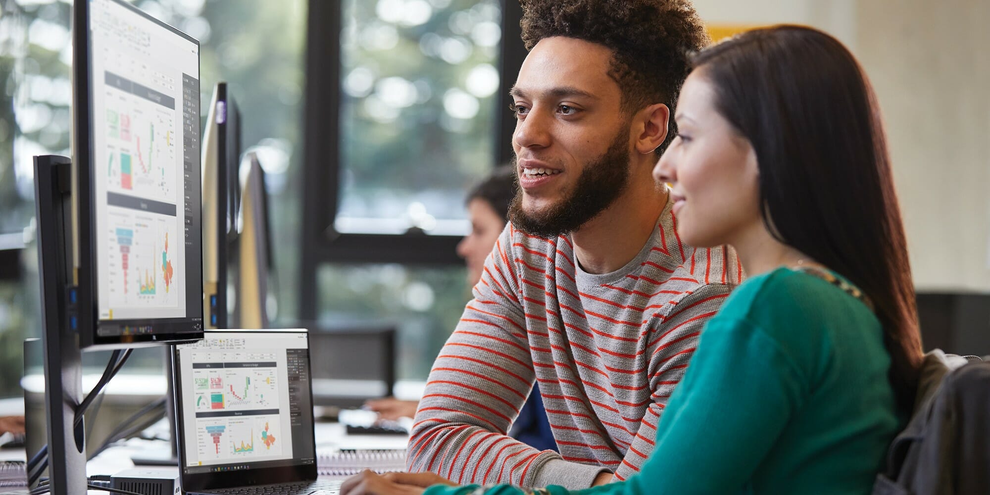 a woman sitting at a table