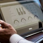 a hand holding a cell phone