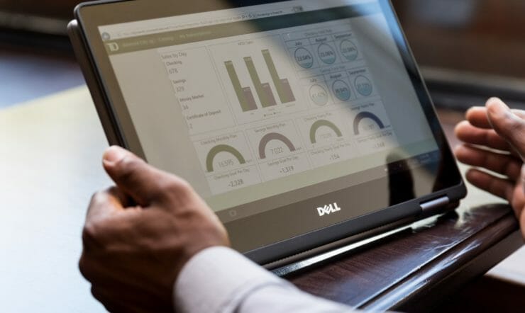 a hand holding a cell phone