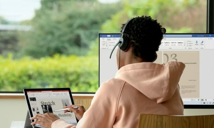 A person working on his laptop.