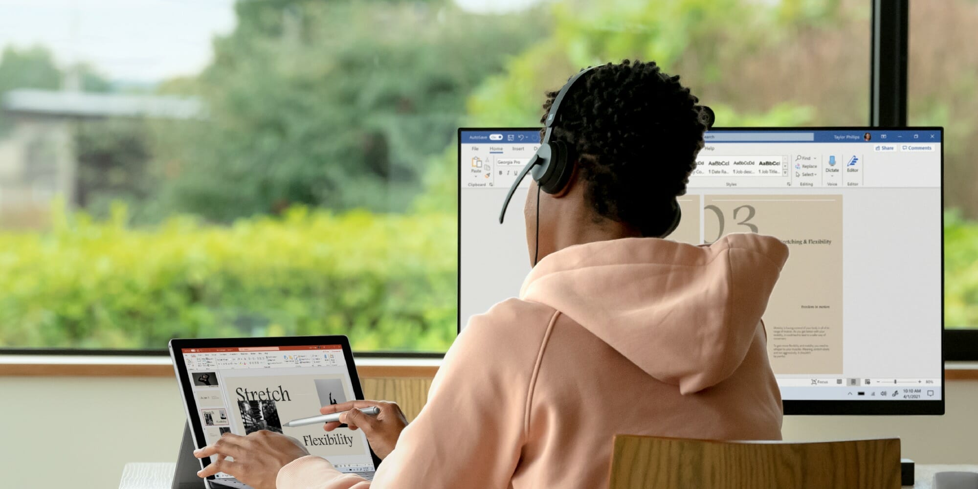 A person working on his laptop.