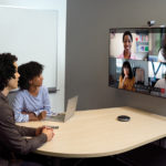 People looking at the screen