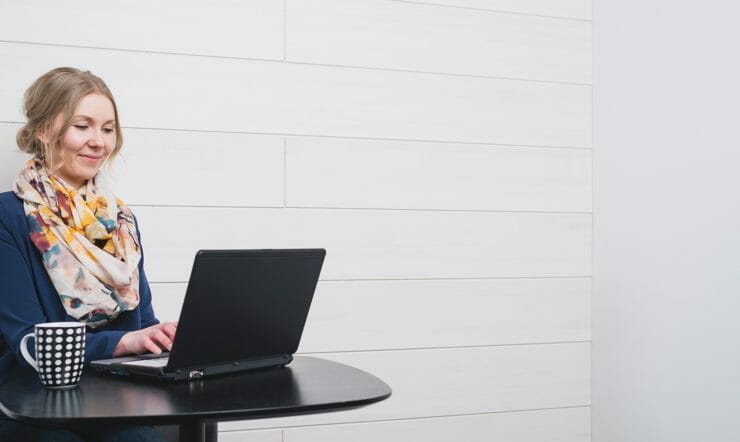A woman working with a laptop