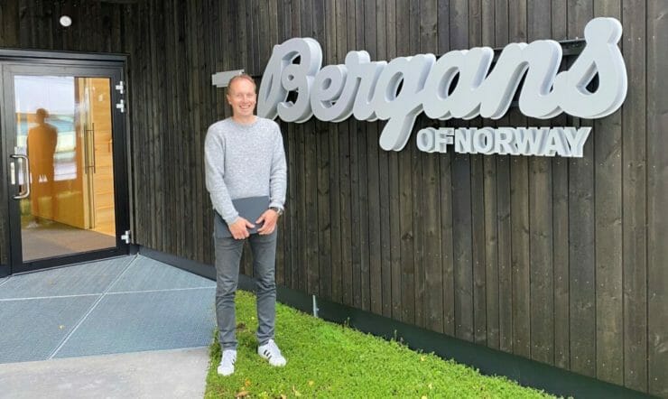 Espen infront of a Bergans sign
