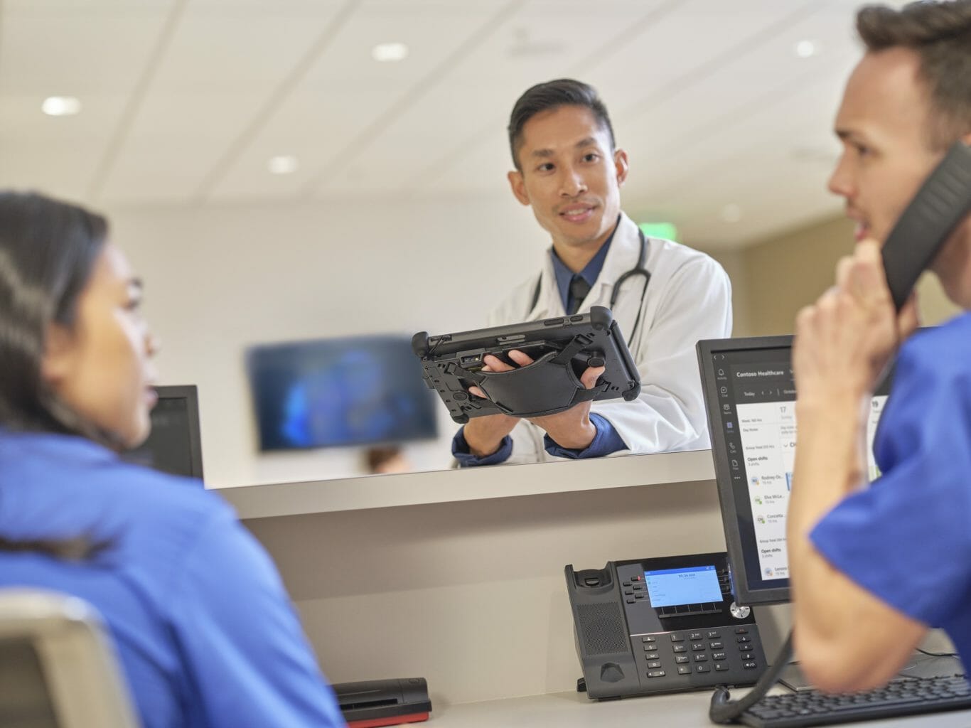 three people talking