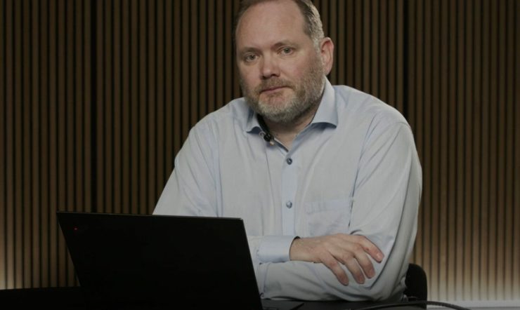 A man looking into the camera