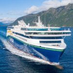 A cruise ship in a fjord