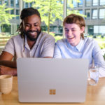 Two people with Surface Laptop Studio