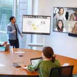 People looking at a screen