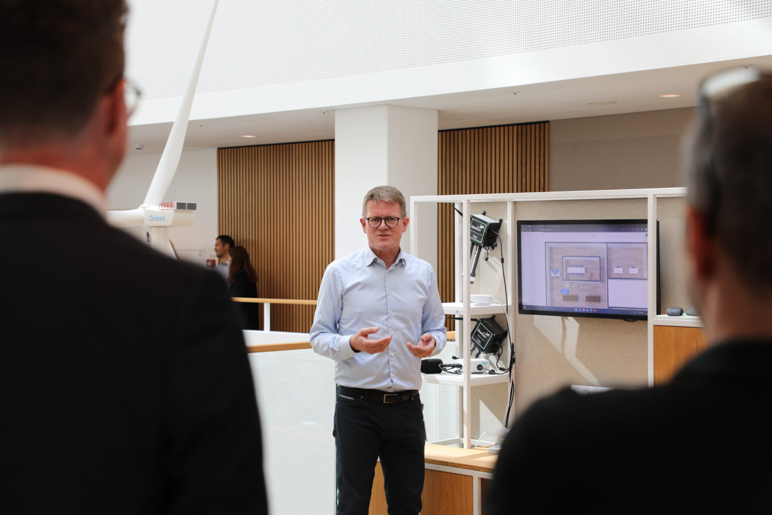 A man explaining at microsoft