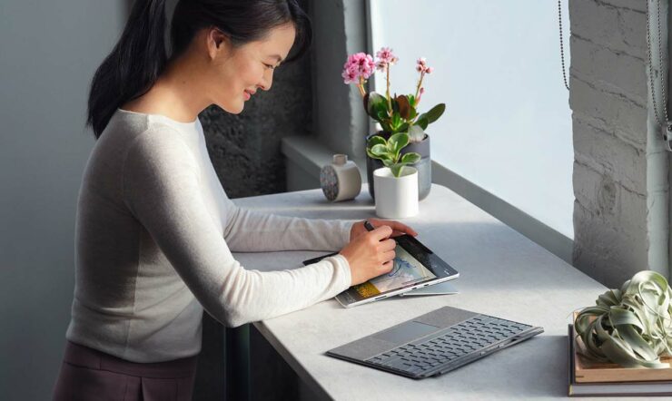 Woman with Surface tablet