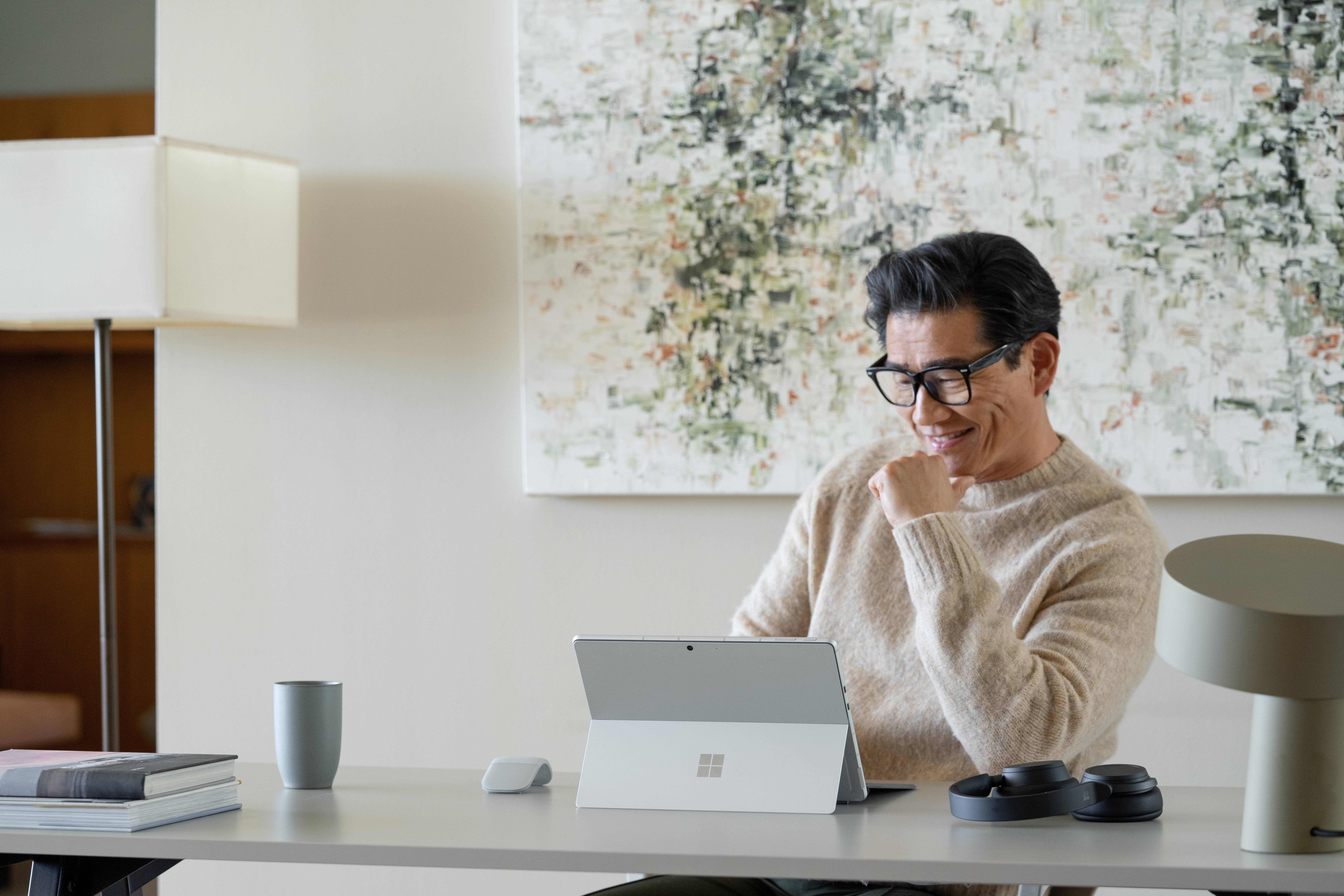Man with Surface Pro 9