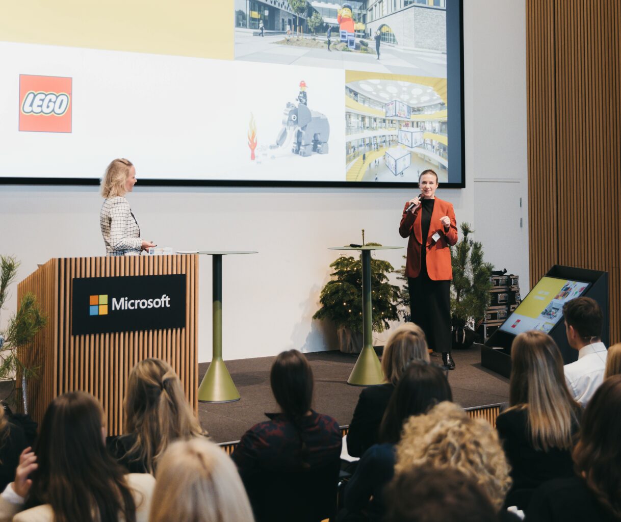 two women on stage talking