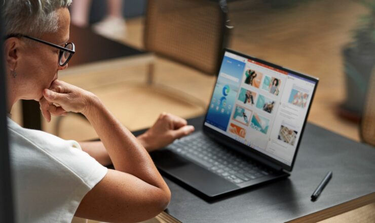 A woman looking at a computer