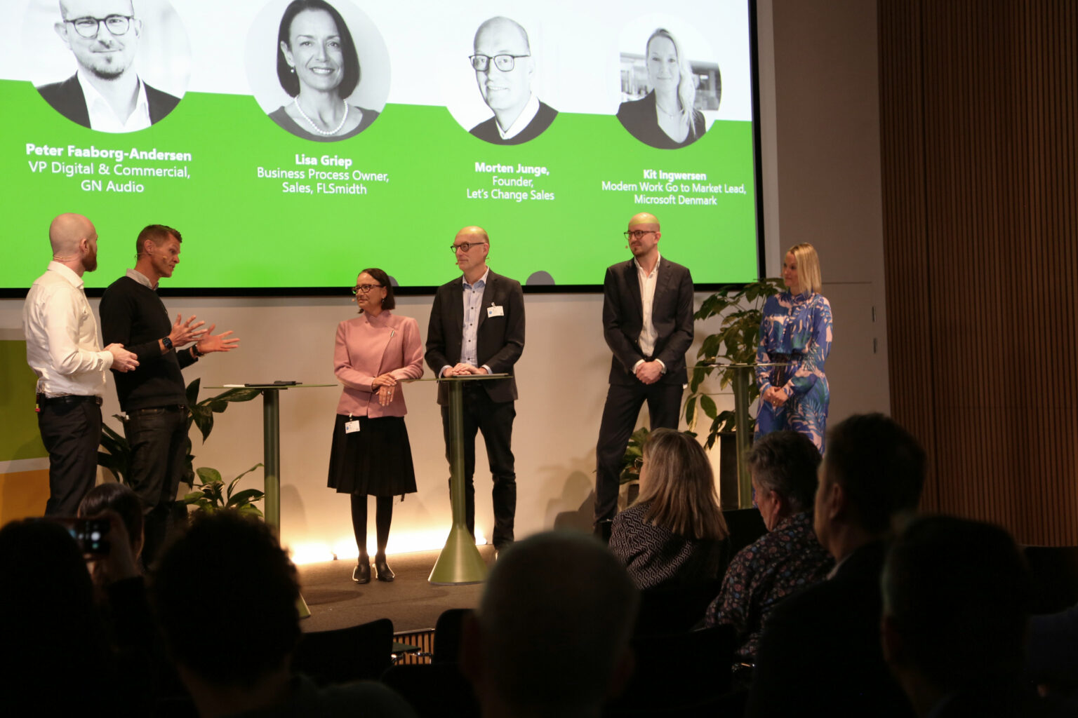 People on stage debating