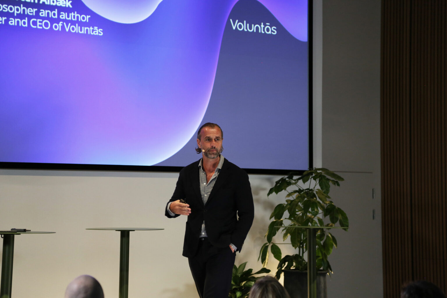 A man on stage talking