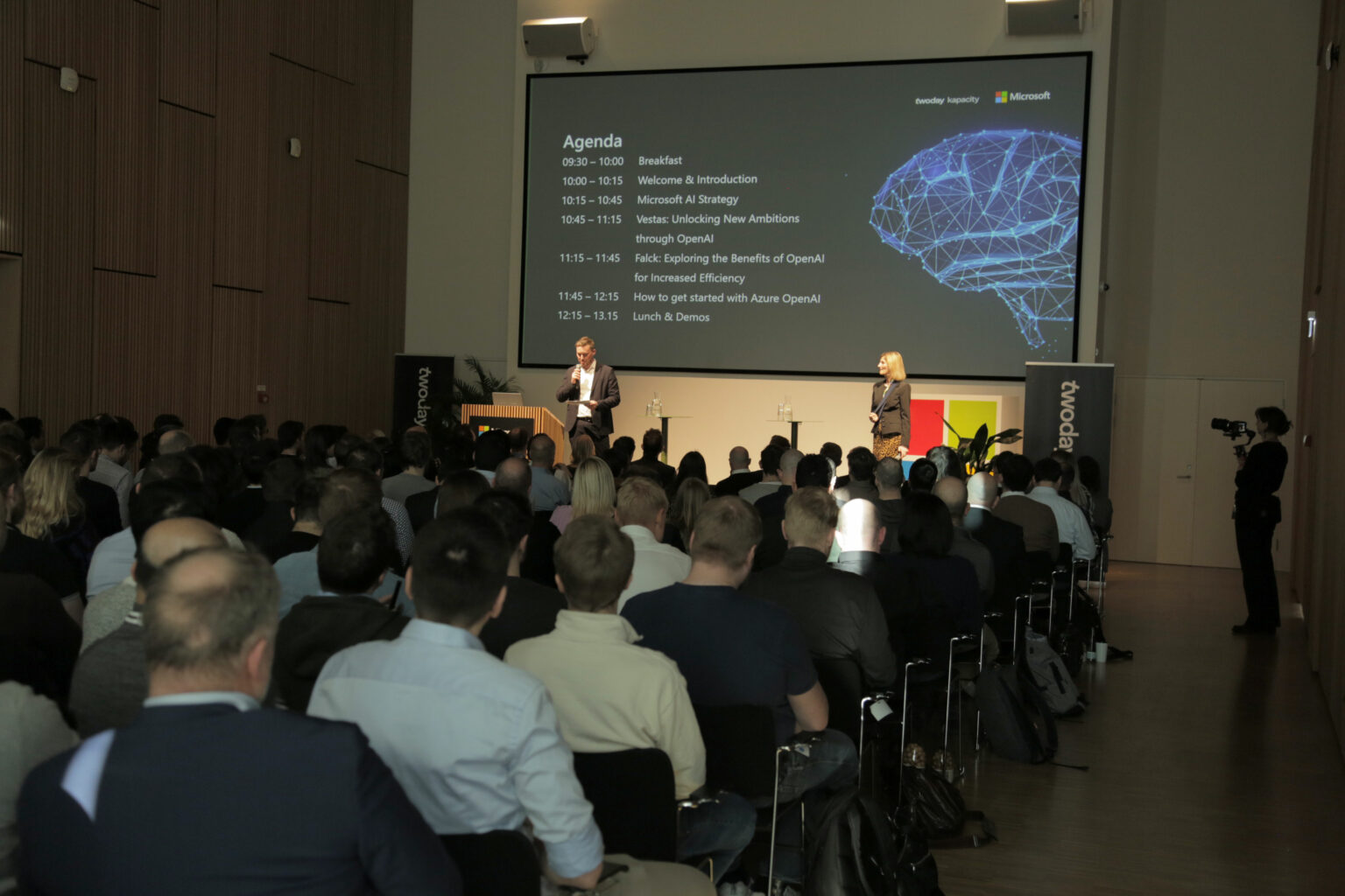 Two people presenting at Microsoft Denmark