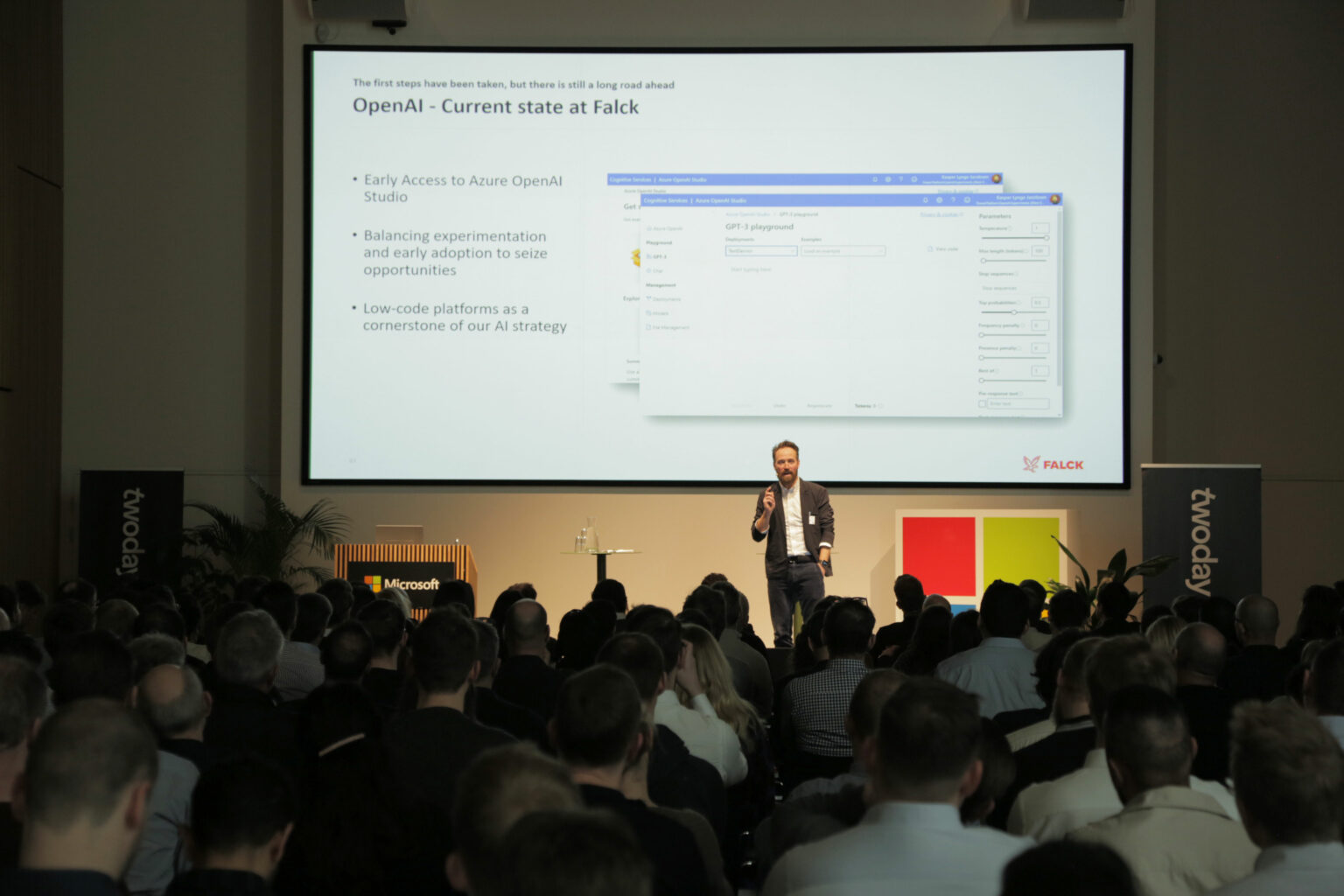 A man on stage presenting at Microsoft Denmark