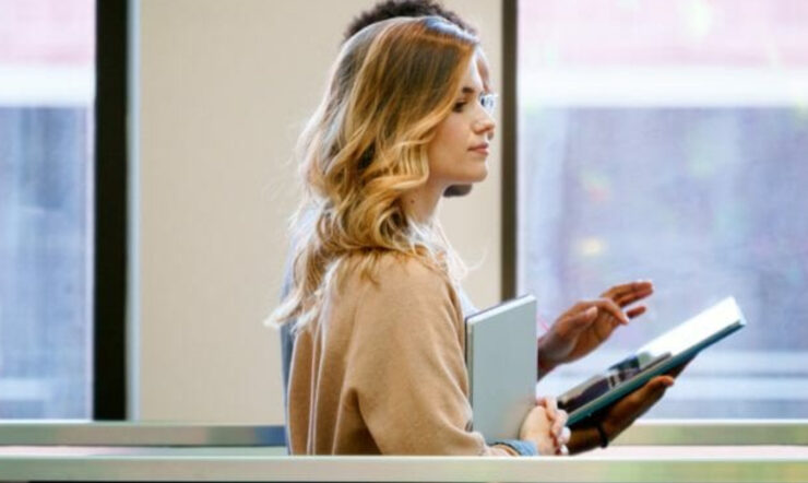 Two people with laptops