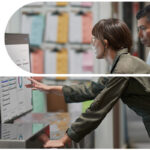 A man and a woman looking at a screen showcasing a dashboard